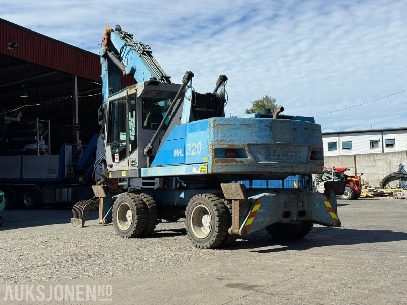 Terex Fuchs MHL 320 hjulgraver / materialhåndteringsmaskin med sorteringsgrabb - Excavator: Foto 3 Terex Fuchs MHL 320 hjulgraver / materialhåndteringsmaskin med sorteringsgrabb - Excavator: Foto 3