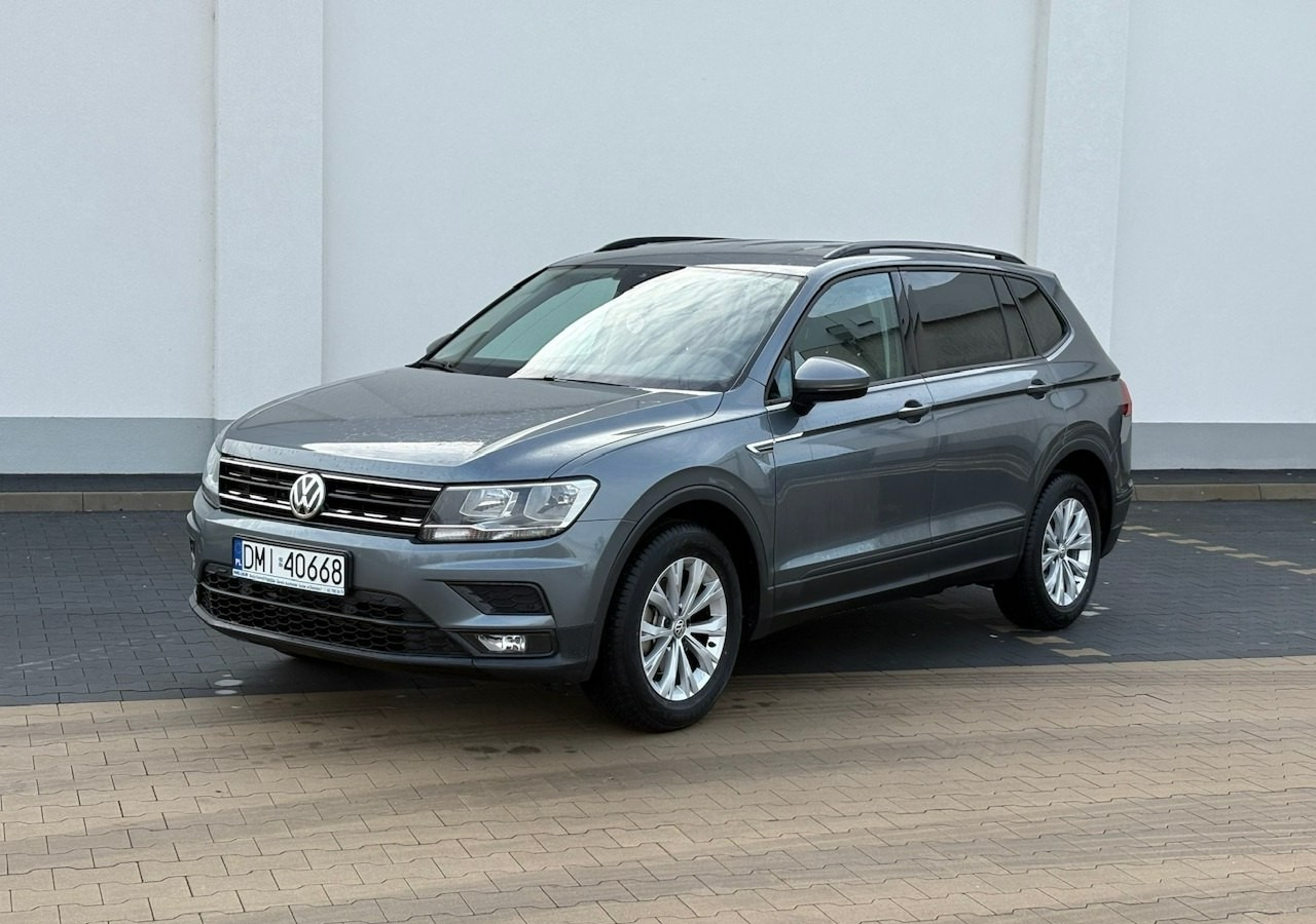 Volkswagen Tiguan II 1,4TSI 150KM 65tyśkm 7osobowy Comfort Tempomat ACC Klima Alu 2018 - SUV: Foto 1 Volkswagen Tiguan II 1,4TSI 150KM 65tyśkm 7osobowy Comfort Tempomat ACC Klima Alu 2018 - SUV: Foto 1