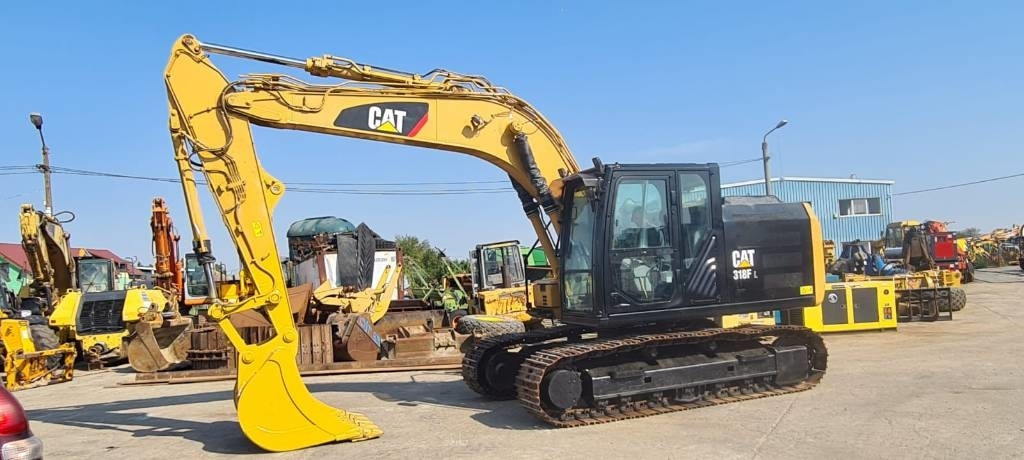 CAT 318FL - Excavator pe şenile: Foto 1 CAT 318FL - Excavator pe şenile: Foto 1