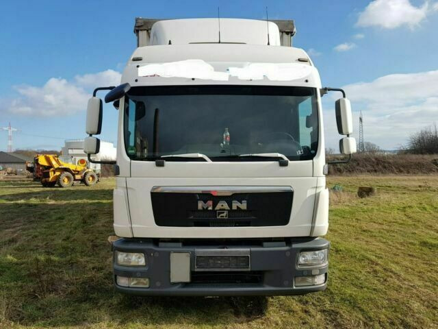 MAN TGL8.240 G.Haus/2xBett Klima AHK - Camion cu prelată: Foto 1 MAN TGL8.240 G.Haus/2xBett Klima AHK - Camion cu prelată: Foto 1