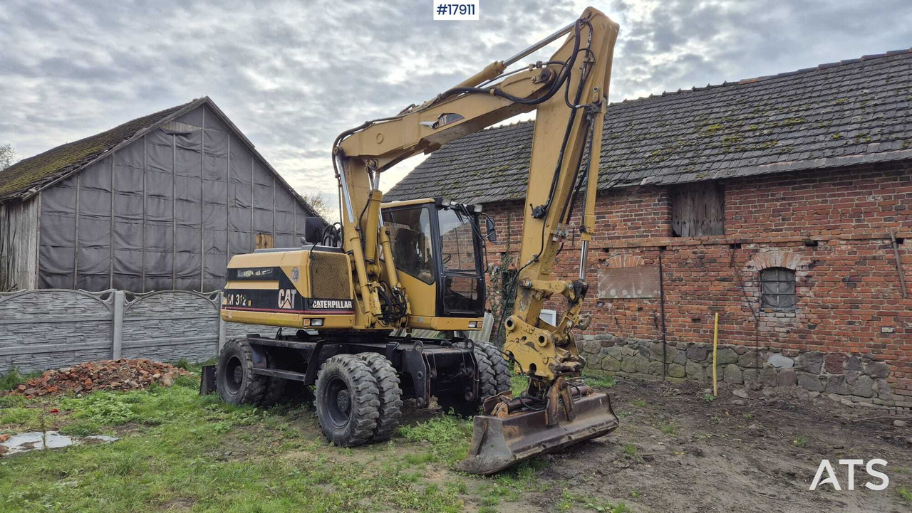 2000 CAT M312 - Excavator pe roţi: Foto 1 2000 CAT M312 - Excavator pe roţi: Foto 1