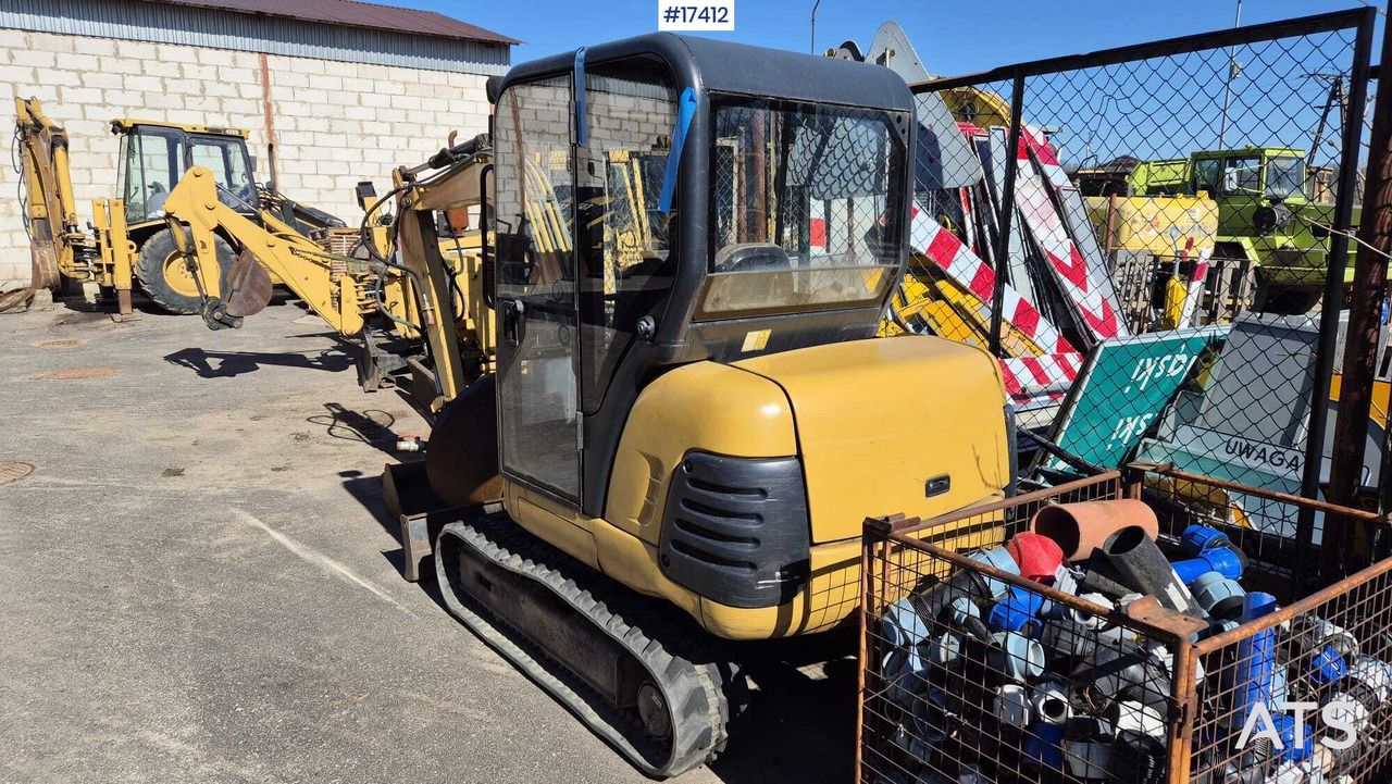 Mini excavator CATERPILLAR 302.5 (2004) two buckets, quick couplers. - Mini excavator: Foto 5 Mini excavator CATERPILLAR 302.5 (2004) two buckets, quick couplers. - Mini excavator: Foto 5