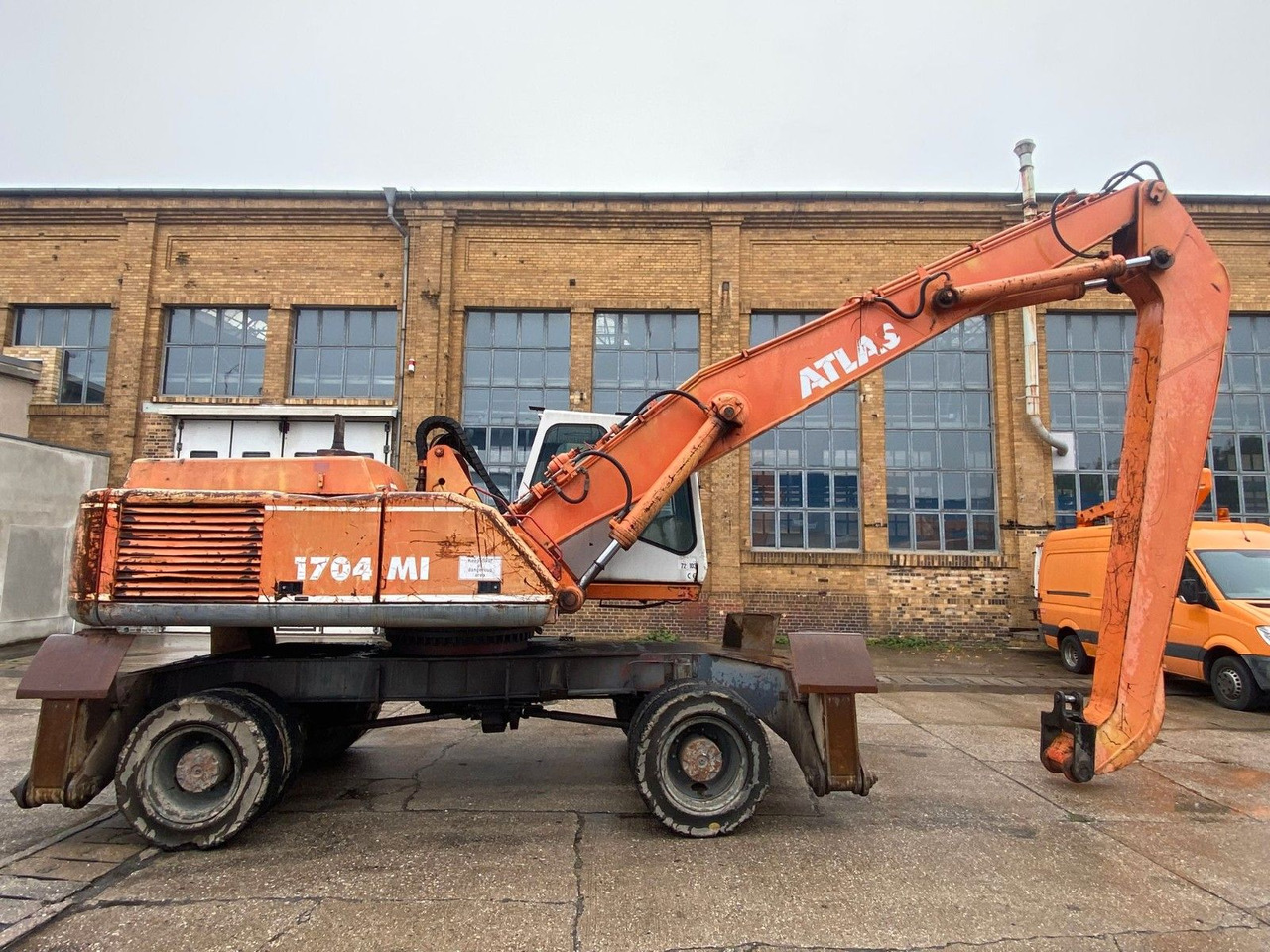 Atlas 1704 MI mit Greifer Umschlagbagger Lang - Excavator pe roţi: Foto 2 Atlas 1704 MI mit Greifer Umschlagbagger Lang - Excavator pe roţi: Foto 2