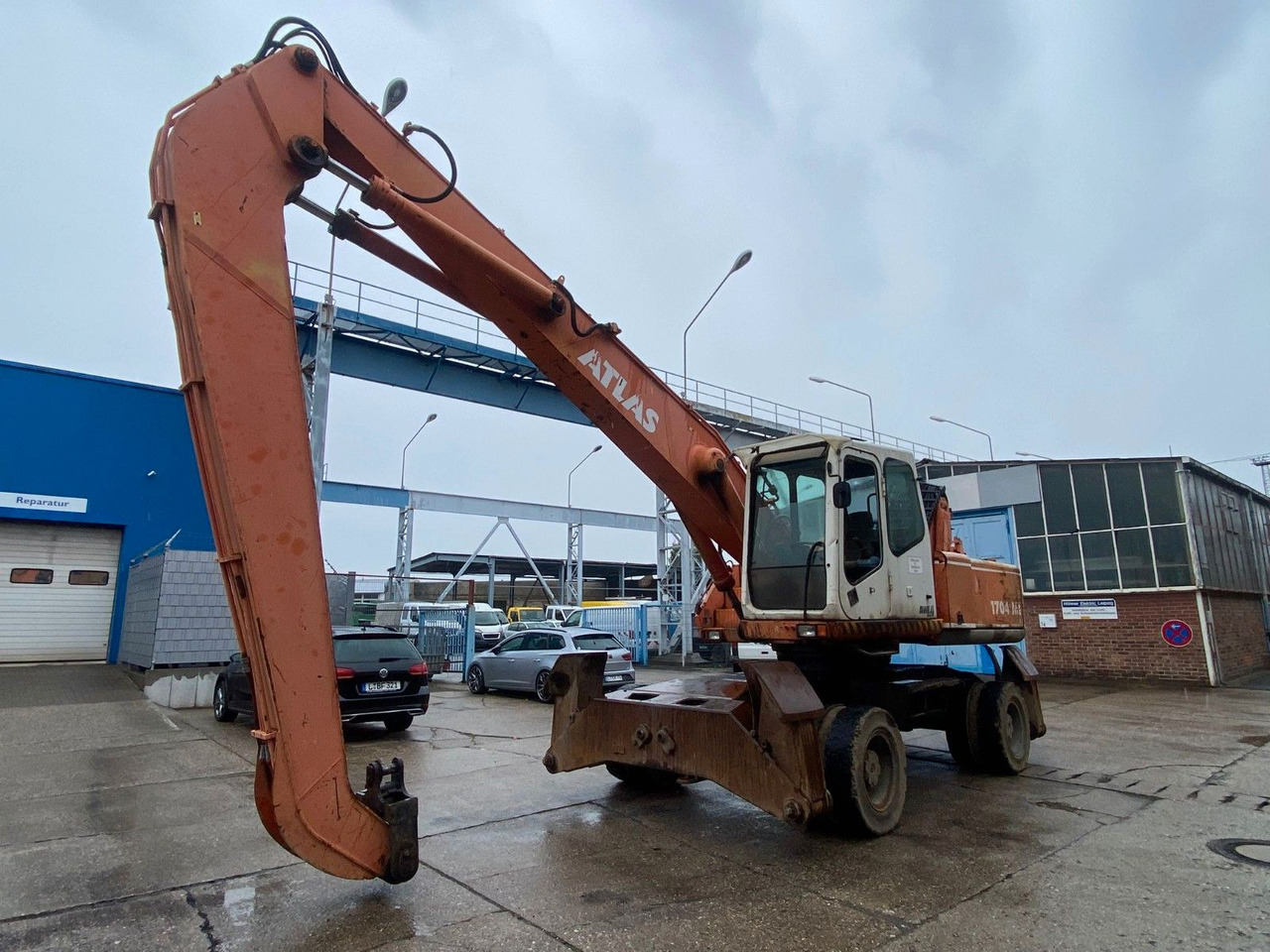 Atlas 1704 MI mit Greifer Umschlagbagger Lang - Excavator pe roţi: Foto 4 Atlas 1704 MI mit Greifer Umschlagbagger Lang - Excavator pe roţi: Foto 4