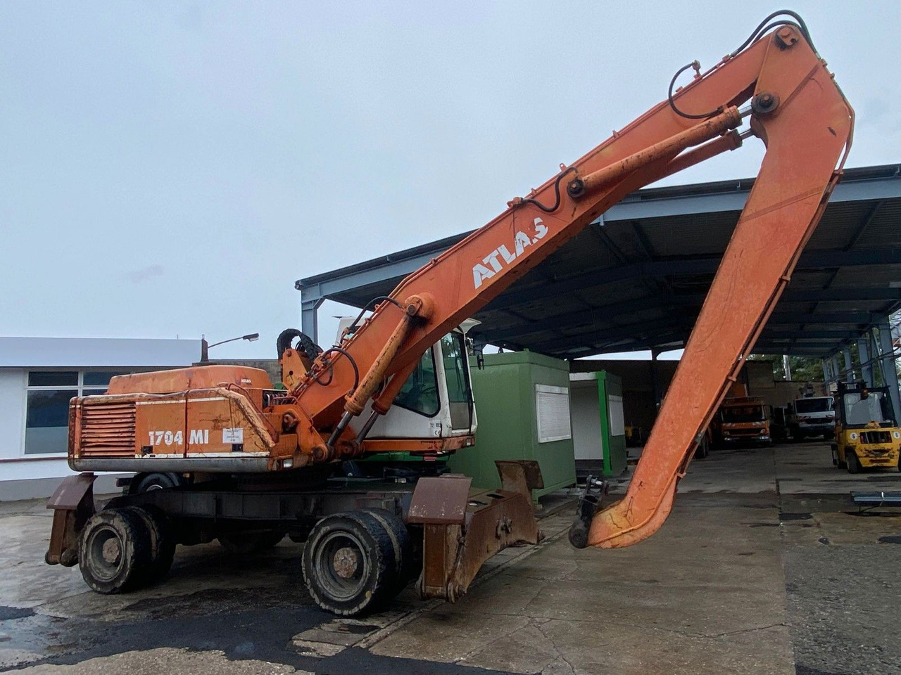 Atlas 1704 MI mit Greifer Umschlagbagger Lang - Excavator pe roţi: Foto 5 Atlas 1704 MI mit Greifer Umschlagbagger Lang - Excavator pe roţi: Foto 5