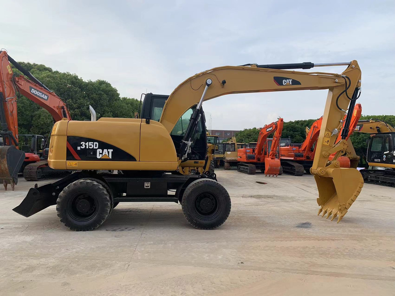 CATERPILLAR 315D - Excavator pe roţi: Foto 1 CATERPILLAR 315D - Excavator pe roţi: Foto 1