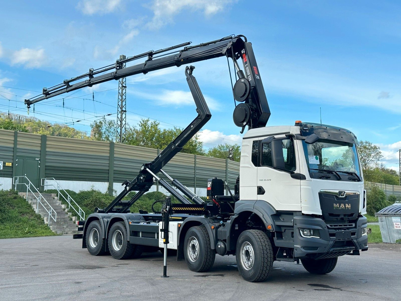MAN TGS 35.520 8x4 Abrollkipper + Kran HIAB 228-6 - Camion cu cârlig, Camion cu macara: Foto 1 MAN TGS 35.520 8x4 Abrollkipper + Kran HIAB 228-6 - Camion cu cârlig, Camion cu macara: Foto 1