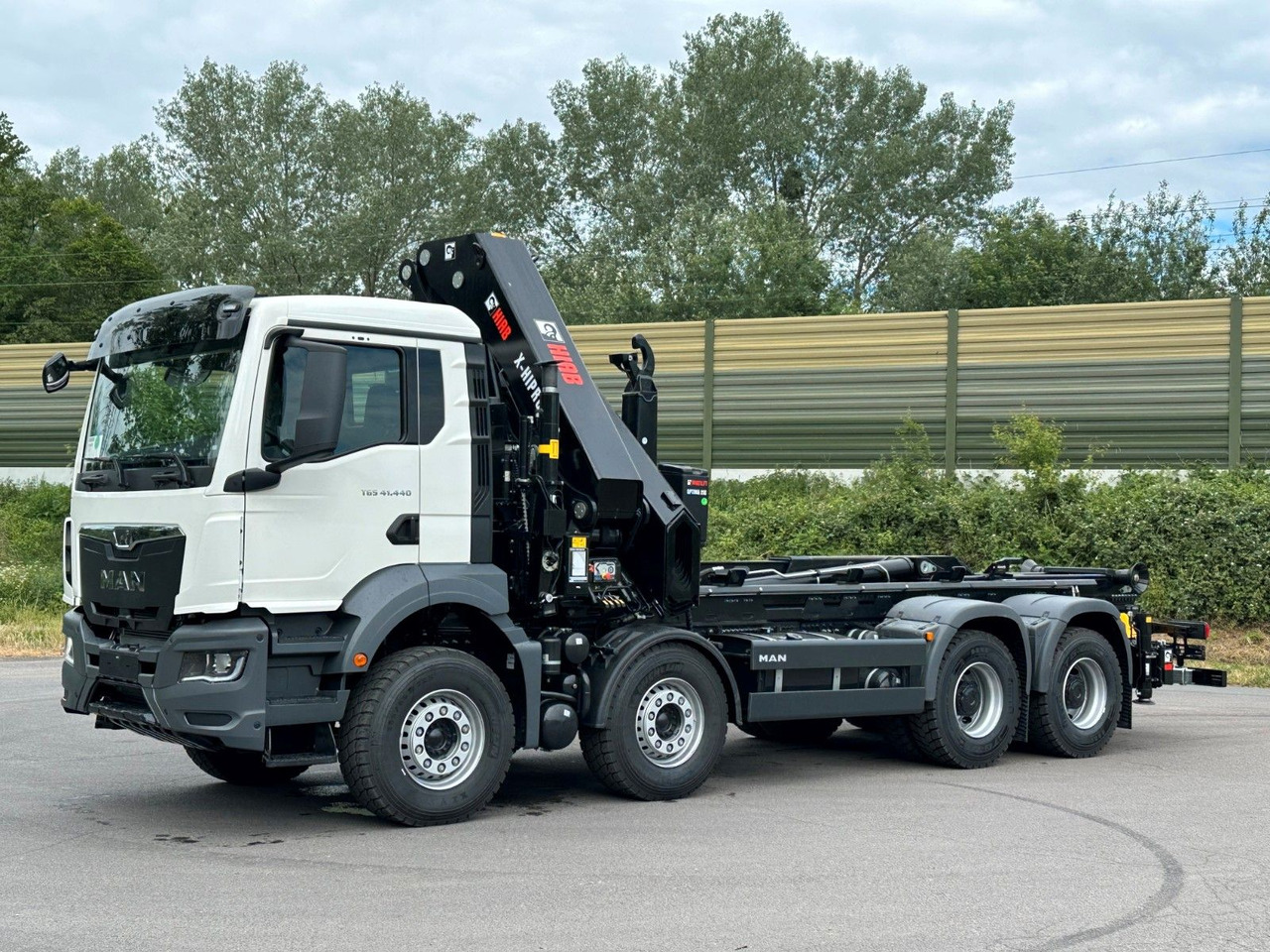 MAN TGS 35.520 8x4 Abrollkipper + Kran HIAB 658E6 - Camion cu cârlig, Camion cu macara: Foto 3 MAN TGS 35.520 8x4 Abrollkipper + Kran HIAB 658E6 - Camion cu cârlig, Camion cu macara: Foto 3