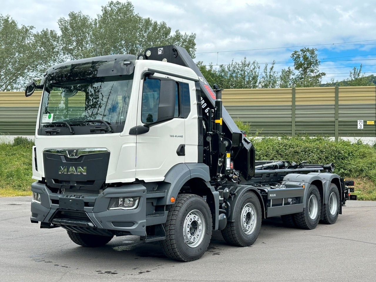 MAN TGS 35.520 8x4 Abrollkipper + Kran HIAB 658E6 - Camion cu cârlig, Camion cu macara: Foto 2 MAN TGS 35.520 8x4 Abrollkipper + Kran HIAB 658E6 - Camion cu cârlig, Camion cu macara: Foto 2