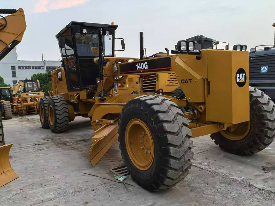 Second Hand Used Construction Machinery Japanese CAT 140G Grader Caterpillar Brand for Sale With Good Condition and Price - Autogreder: Foto 4 Second Hand Used Construction Machinery Japanese CAT 140G Grader Caterpillar Brand for Sale With Good Condition and Price - Autogreder: Foto 4
