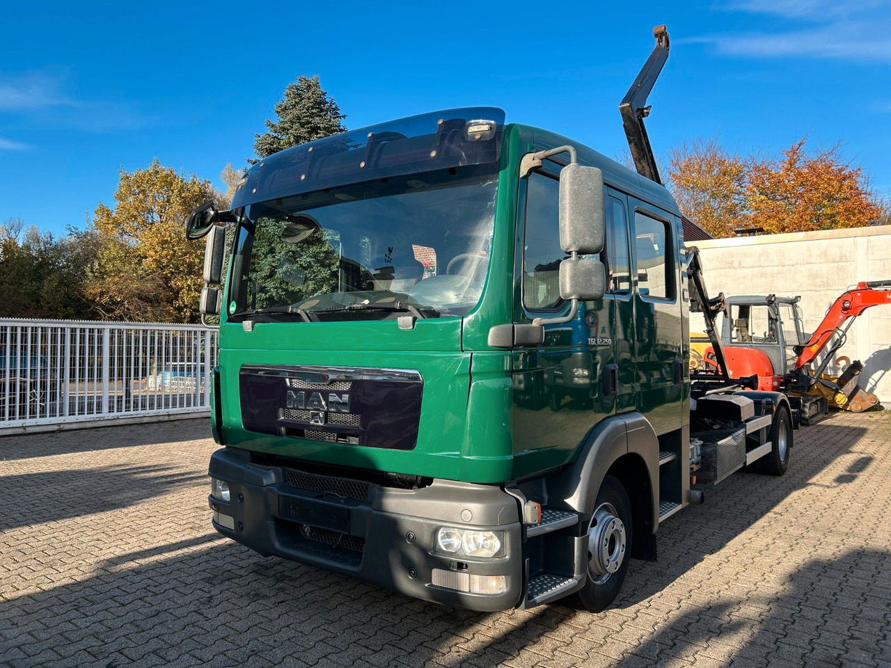 MAN 12.250 Doppelkabine Abroller - Camion cu cârlig: Foto 1 MAN 12.250 Doppelkabine Abroller - Camion cu cârlig: Foto 1