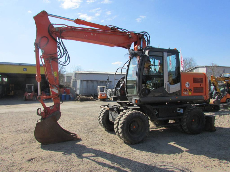 Hitachi ZX 140 W-3 Mobilbagger 48.000 EUR / Klima - Excavator pe roţi: Foto 1 Hitachi ZX 140 W-3 Mobilbagger 48.000 EUR / Klima - Excavator pe roţi: Foto 1