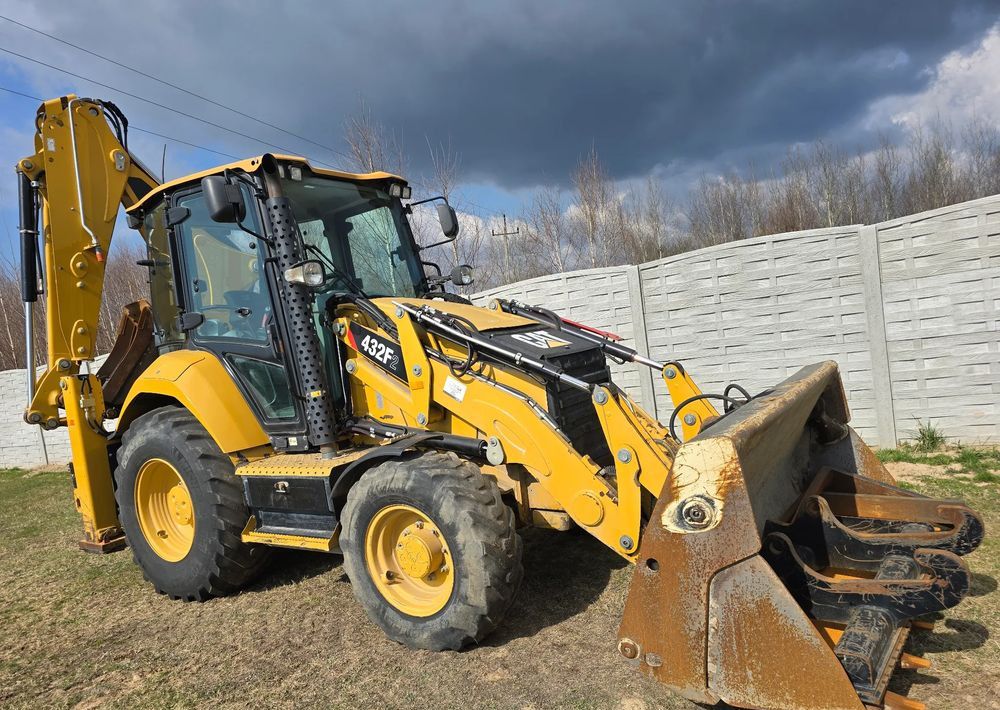 Caterpillar - Buldoexcavator: Foto 2 Caterpillar - Buldoexcavator: Foto 2