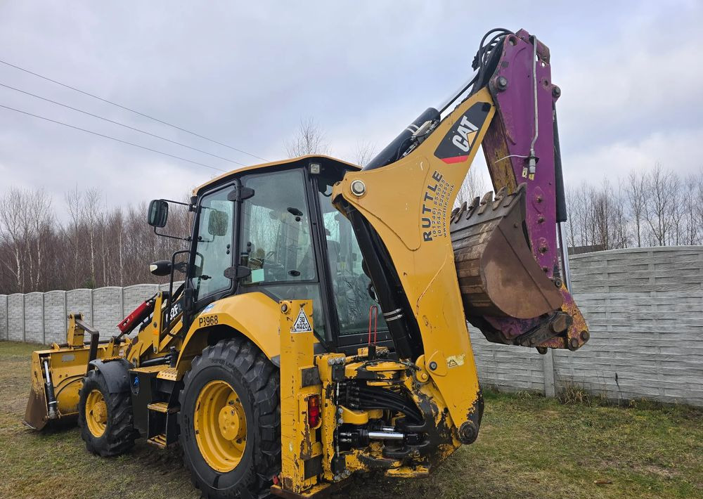 Buldoexcavator Caterpillar: Foto 8