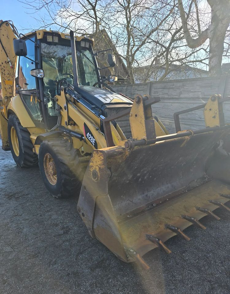 Caterpillar - Buldoexcavator: Foto 2 Caterpillar - Buldoexcavator: Foto 2