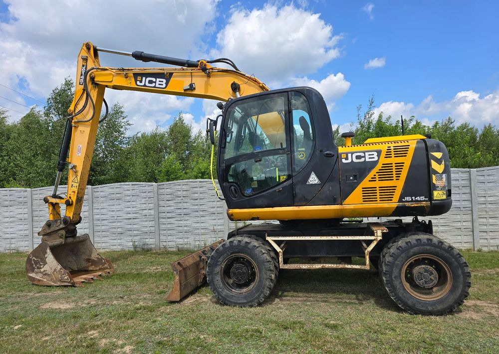 JCB - Excavator pe roţi: Foto 1 JCB - Excavator pe roţi: Foto 1