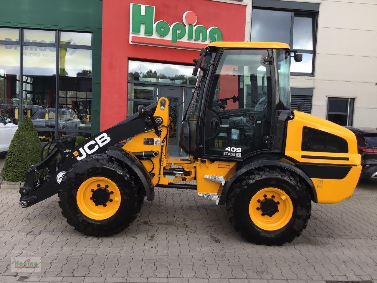 JCB 409 - Încărcător frontal pe pneuri: Foto 1 JCB 409 - Încărcător frontal pe pneuri: Foto 1