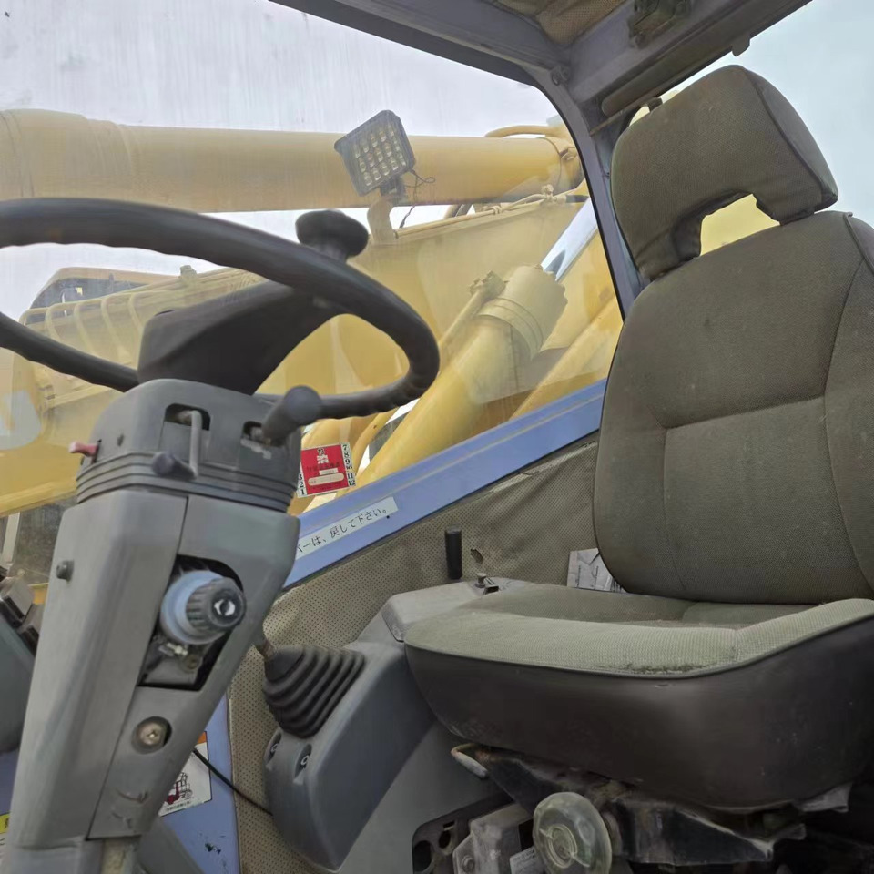 KOMATSU PC128US - Excavator pe roţi: Foto 5 KOMATSU PC128US - Excavator pe roţi: Foto 5