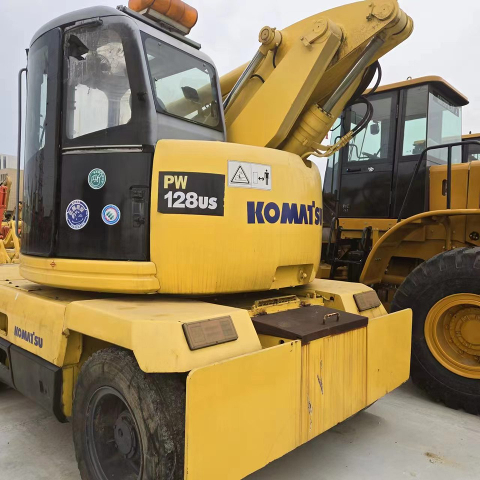 KOMATSU PC128US - Excavator pe roţi: Foto 4 KOMATSU PC128US - Excavator pe roţi: Foto 4