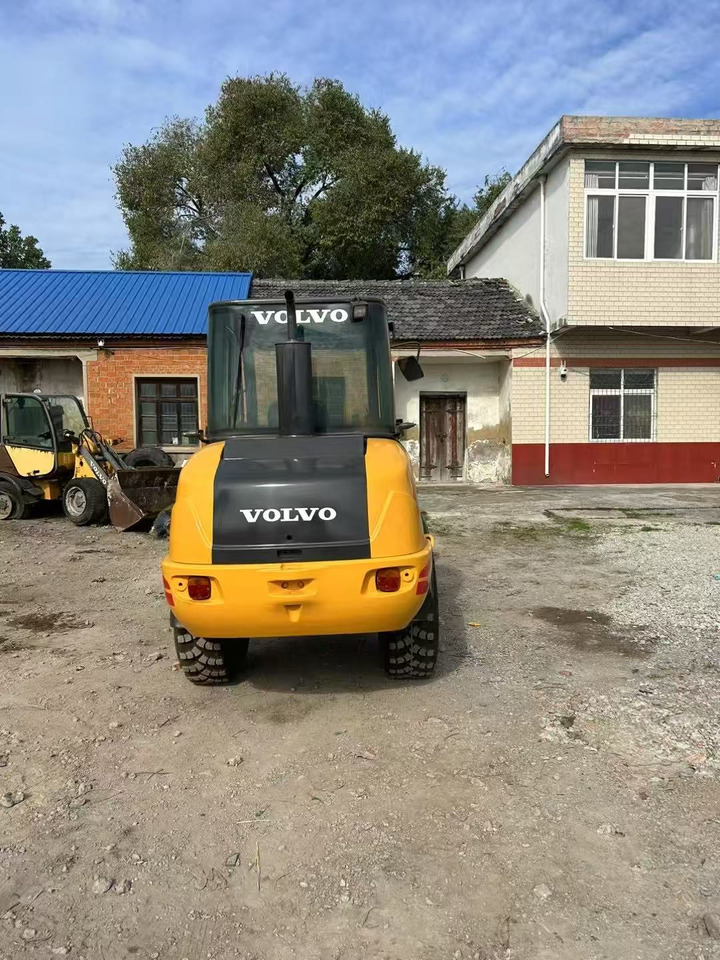 Încărcător frontal pe pneuri Volvo L20F: Foto 7