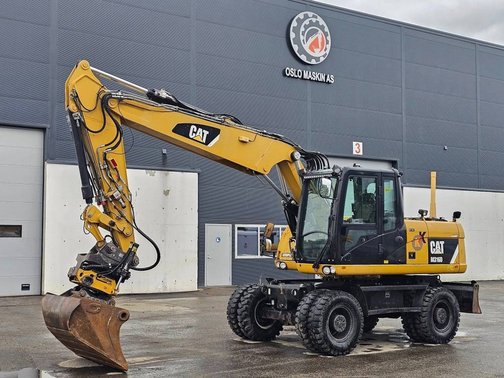 CAT M 316 D - Excavator pe roţi: Foto 1 CAT M 316 D - Excavator pe roţi: Foto 1