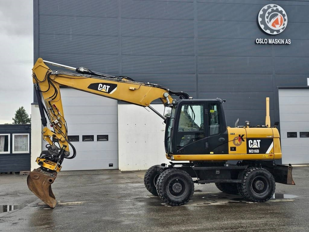 CAT M 316 D - Excavator pe roţi: Foto 2 CAT M 316 D - Excavator pe roţi: Foto 2