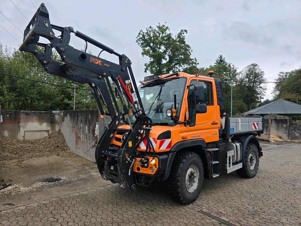 Unimog U318 NKS-F-UGE-42 Frontlader Mercedes-Benz 405/10 405/12 UGE Mercedes-Benz U 318 323 327 423 427 429 430 EasyDrive Variopilot Radlader Hauer rx 500 Frontlader - Maşina comunala: Foto 1 Unimog U318 NKS-F-UGE-42 Frontlader Mercedes-Benz 405/10 405/12 UGE Mercedes-Benz U 318 323 327 423 427 429 430 EasyDrive Variopilot Radlader Hauer rx 500 Frontlader - Maşina comunala: Foto 1