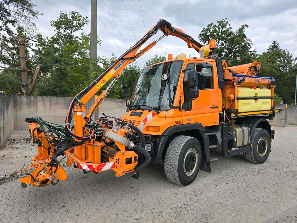 Unimog U400 2013 405/10 405/12 NKS-Z-UGN-43K Bluetec 5 Mercedes-Benz  UGE UGN Mulag MKM700 Mähausleger Böschungsmäher Böschungsmulcher Küpper-Weisser IMS Salzstreuer - Utilaj deszăpezire: Foto 1 Unimog U400 2013 405/10 405/12 NKS-Z-UGN-43K Bluetec 5 Mercedes-Benz  UGE UGN Mulag MKM700 Mähausleger Böschungsmäher Böschungsmulcher Küpper-Weisser IMS Salzstreuer - Utilaj deszăpezire: Foto 1