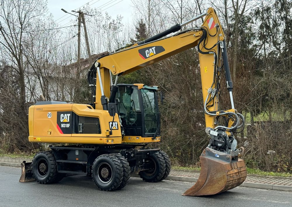 Caterpillar CAT 318 F * Powertilt * Sprowadzony* 9700 MTG * Caterpillar * Stan Perfekcyjny - Excavator pe roţi: Foto 3 Caterpillar CAT 318 F * Powertilt * Sprowadzony* 9700 MTG * Caterpillar * Stan Perfekcyjny - Excavator pe roţi: Foto 3