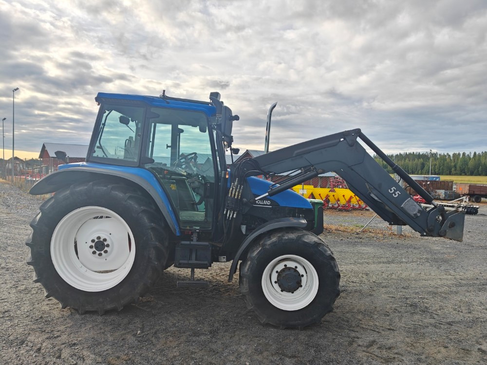 New Holland TS100, ES vaihteisto, ilmastointi, etukuormaaja Ålö Q55, katso video! - Tractor agricol: Foto 5 New Holland TS100, ES vaihteisto, ilmastointi, etukuormaaja Ålö Q55, katso video! - Tractor agricol: Foto 5