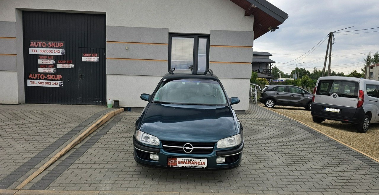 Opel Omega B 2,5 v6 *automat* napęd tył *welury* - Mașină break: Foto 2 Opel Omega B 2,5 v6 *automat* napęd tył *welury* - Mașină break: Foto 2