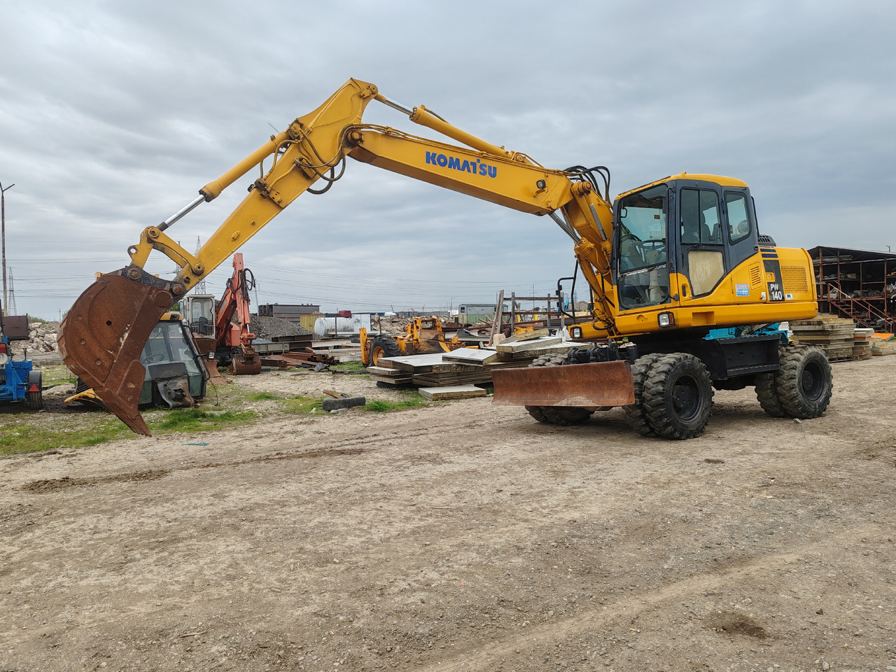 Komatsu PW140-7 - Excavator pe roţi: Foto 1 Komatsu PW140-7 - Excavator pe roţi: Foto 1