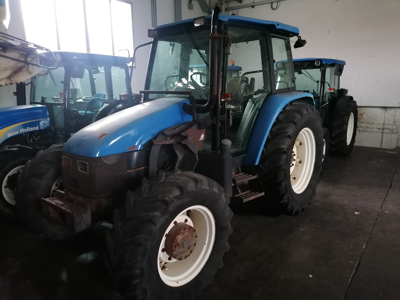 NEW HOLLAND TL 90 - Tractor agricol: Foto 3 NEW HOLLAND TL 90 - Tractor agricol: Foto 3