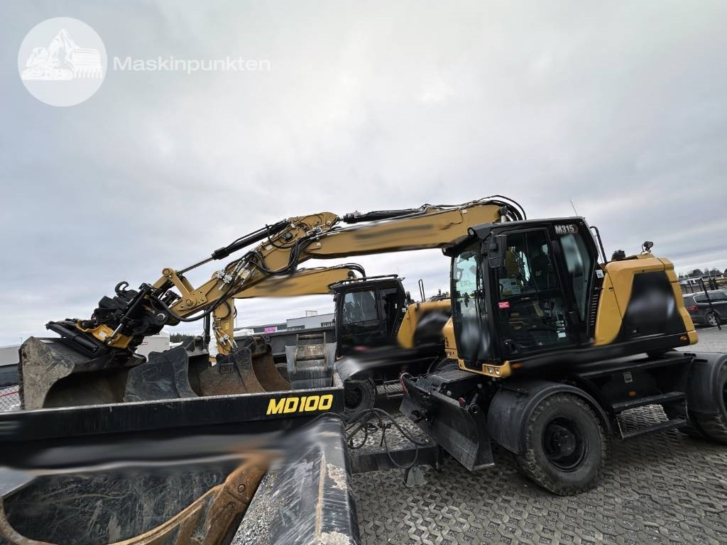 CAT M 315 - Excavator pe roţi: Foto 1 CAT M 315 - Excavator pe roţi: Foto 1