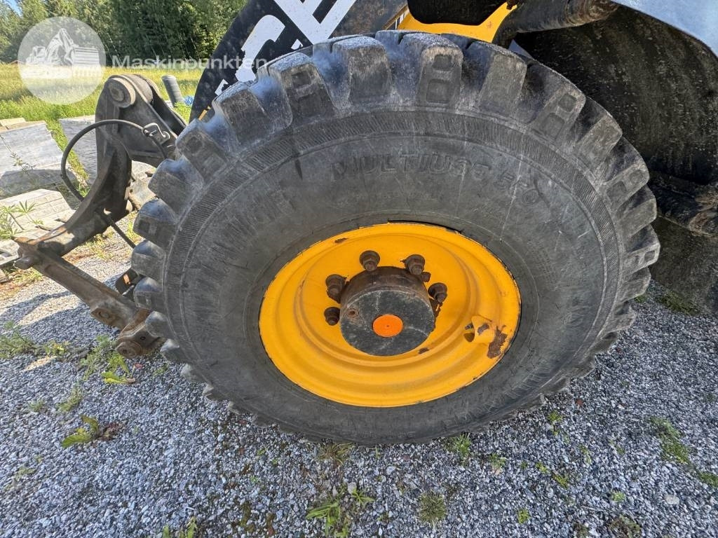 Încărcător frontal pe pneuri JCB 413 K: Foto 7