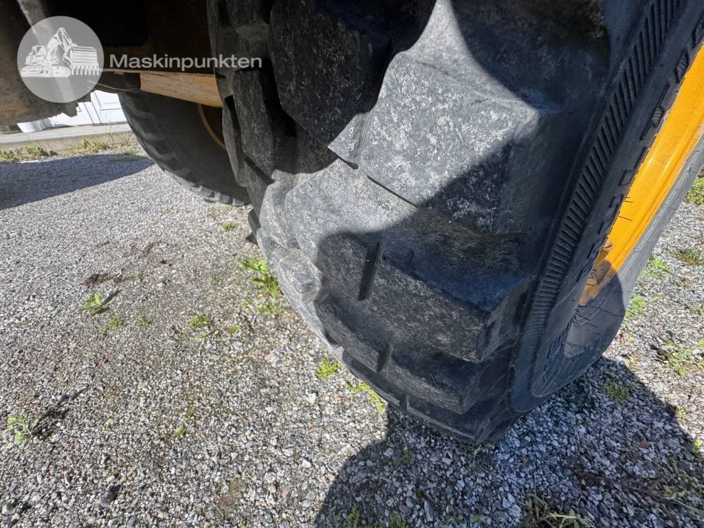 Încărcător frontal pe pneuri JCB 413 K: Foto 23