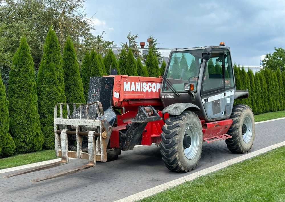 Manitou MT 1233S 12 M - Stivuitor telescopic: Foto 1 Manitou MT 1233S 12 M - Stivuitor telescopic: Foto 1