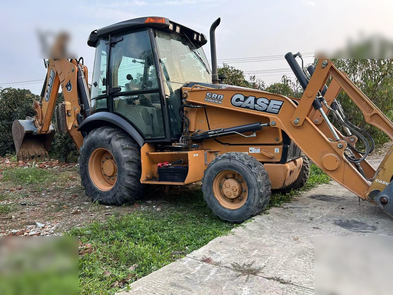 CASE 580 - Buldoexcavator: Foto 1 CASE 580 - Buldoexcavator: Foto 1