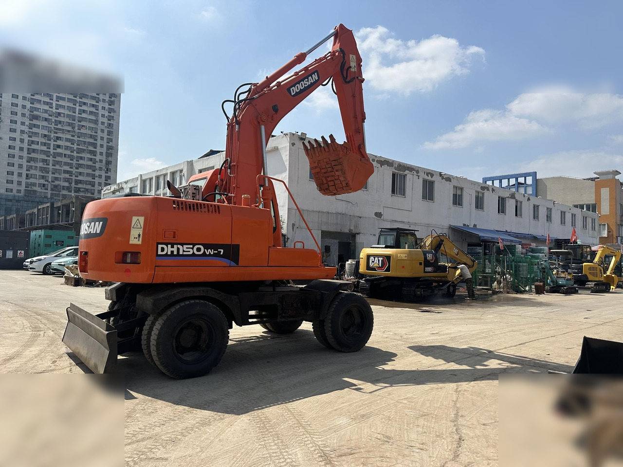 DOOSAN DH150W-7 - Excavator pe roţi: Foto 1 DOOSAN DH150W-7 - Excavator pe roţi: Foto 1