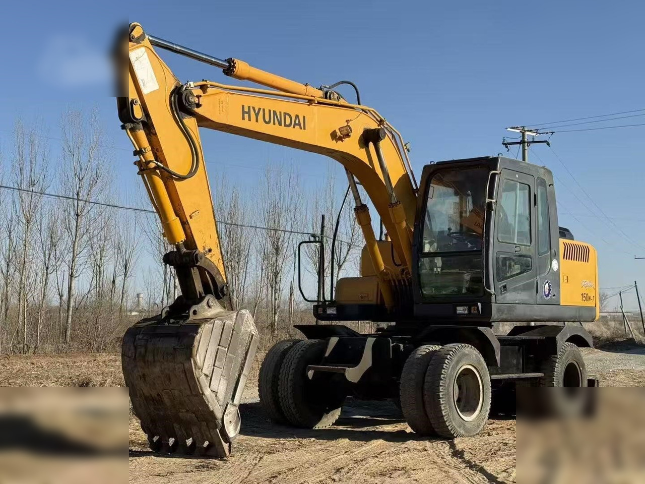 HYUNDAI ROBEX 150W-7A - Excavator pe roţi: Foto 3 HYUNDAI ROBEX 150W-7A - Excavator pe roţi: Foto 3