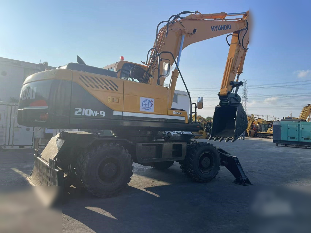 HYUNDAI ROBEX 210W-9 - Excavator pe roţi: Foto 2 HYUNDAI ROBEX 210W-9 - Excavator pe roţi: Foto 2