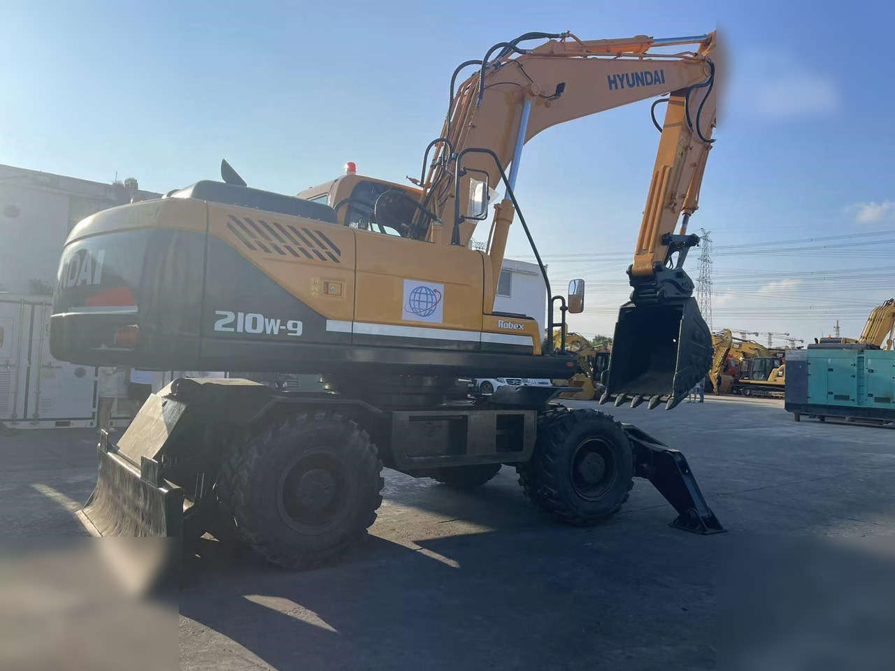 HYUNDAI ROBEX 210W-9S - Excavator pe roţi: Foto 2 HYUNDAI ROBEX 210W-9S - Excavator pe roţi: Foto 2