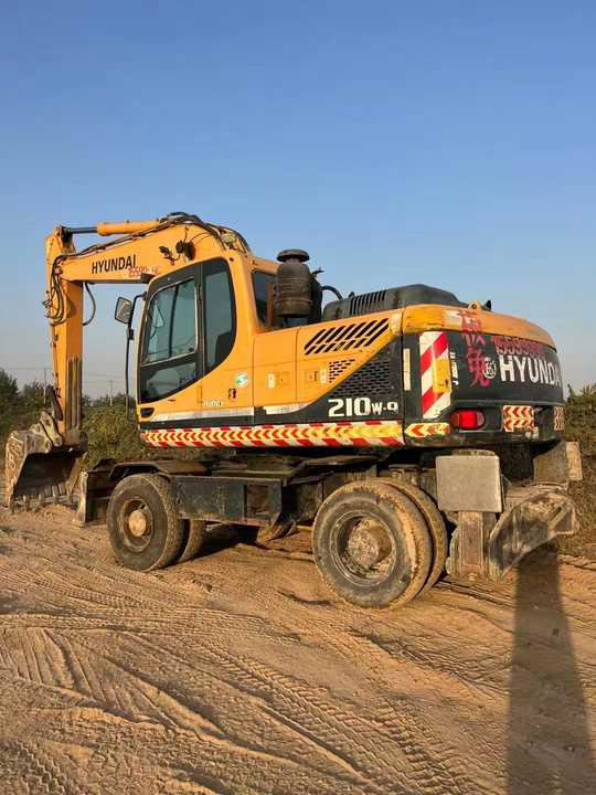 Well-Maintained Hyundai 210-9Used Wheel Excavator Construction Machine | No Major Repairs | Price Negotiable - Excavator pe roţi: Foto 2 Well-Maintained Hyundai 210-9Used Wheel Excavator Construction Machine | No Major Repairs | Price Negotiable - Excavator pe roţi: Foto 2