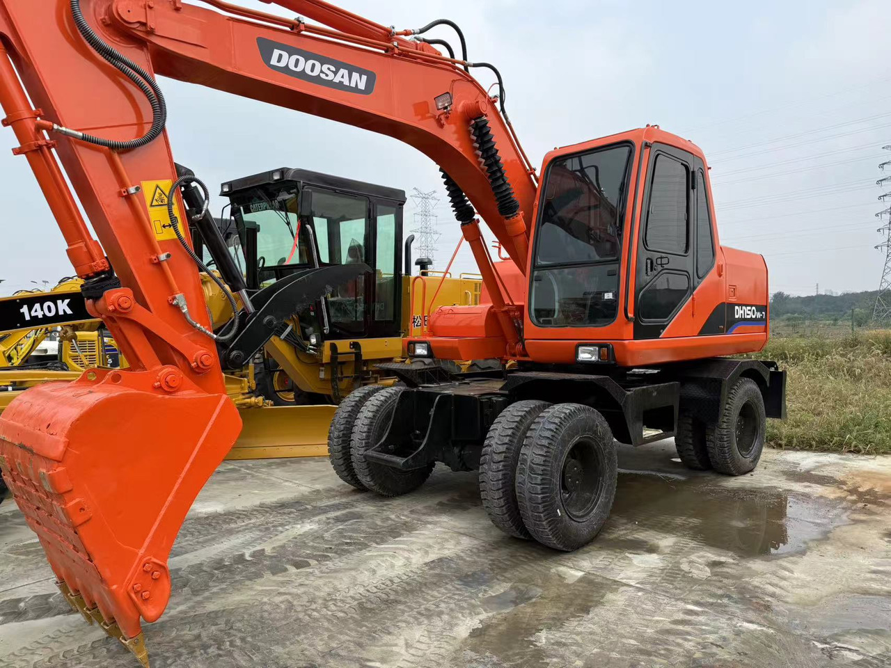 DOOSAN DH150W-7 - Excavator pe roţi: Foto 1 DOOSAN DH150W-7 - Excavator pe roţi: Foto 1