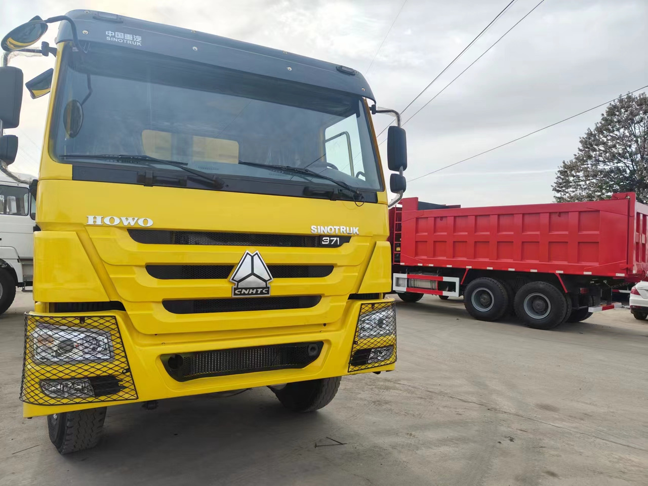 HOWO 371 Dump Truck Click Here for Discount - Camion basculantă: Foto 1 HOWO 371 Dump Truck Click Here for Discount - Camion basculantă: Foto 1