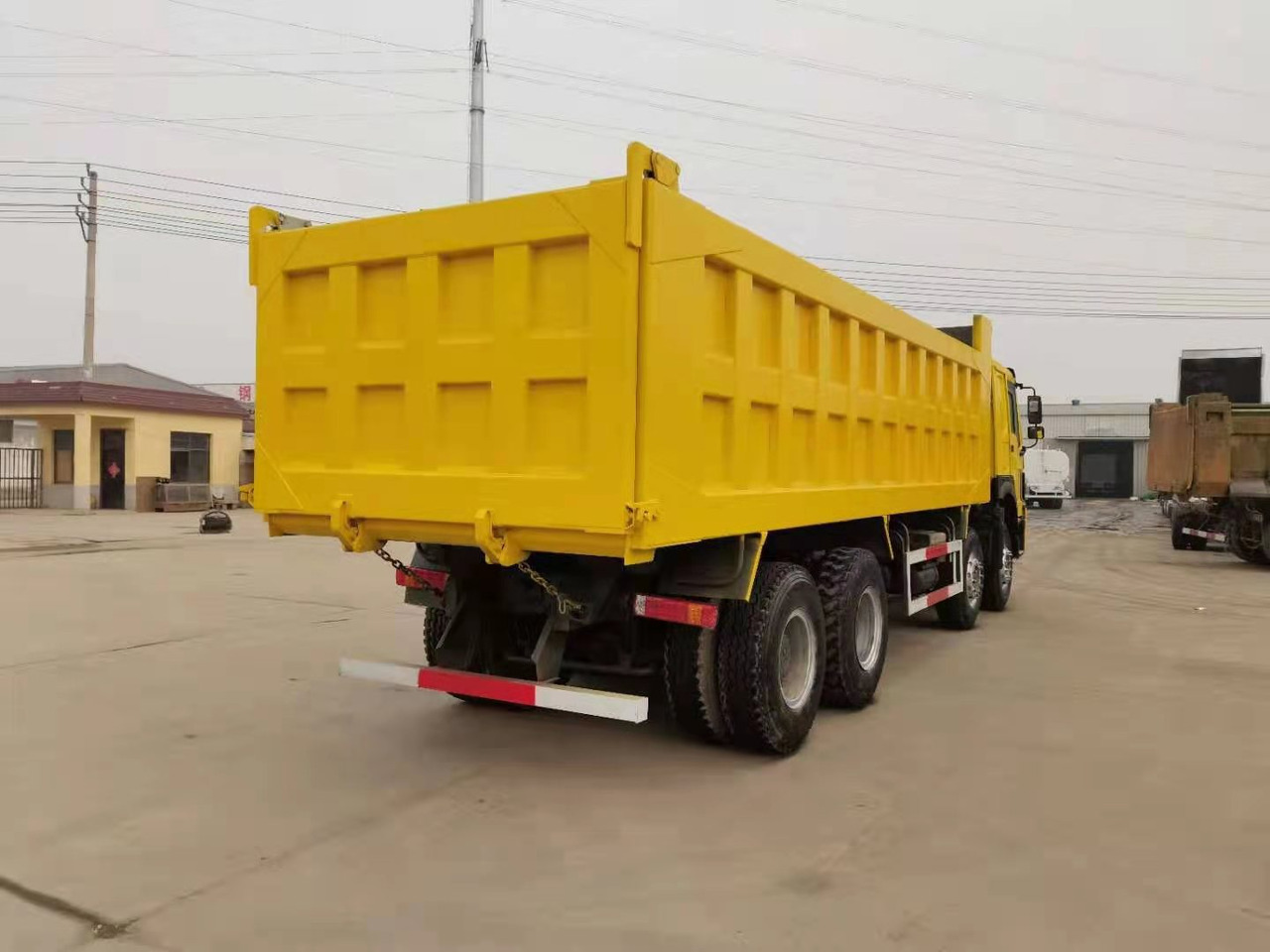SINOTRUK HOWO 375 8X4 CLICK HERE FOR DISCOUNT - Camion basculantă: Foto 4 SINOTRUK HOWO 375 8X4 CLICK HERE FOR DISCOUNT - Camion basculantă: Foto 4