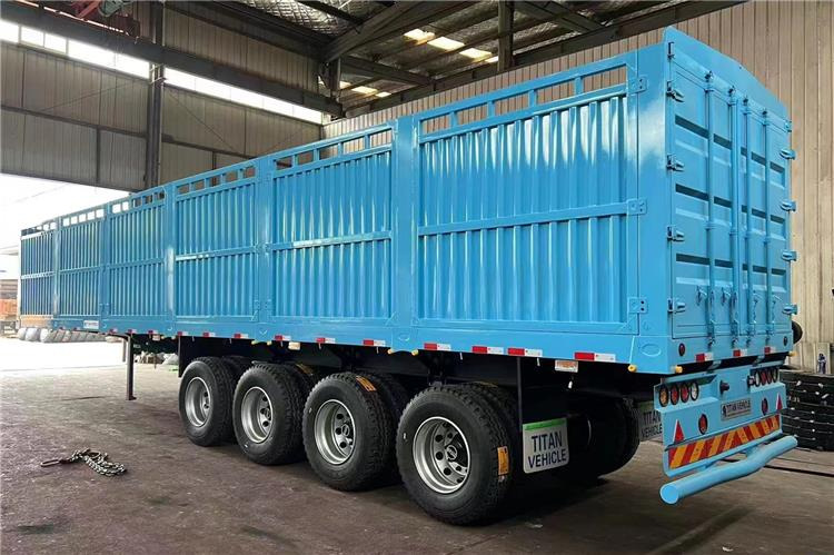 TITAN 4 Axle Fence Semi Truck Trailer for Sale price In Rwanda - Semiremorcă transport animale: Foto 1 TITAN 4 Axle Fence Semi Truck Trailer for Sale price In Rwanda - Semiremorcă transport animale: Foto 1