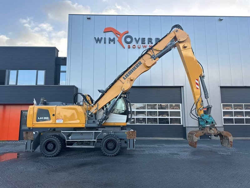 Excavator pentru manipulare de materiale pentru transport de deşeurilor Liebherr LH 30 M: Foto 9
