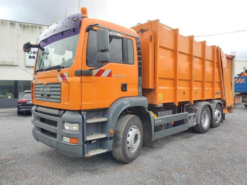 MAN TGA 26.320 6x2 garbage truck ZOELLER - Autogunoiere: Foto 1 MAN TGA 26.320 6x2 garbage truck ZOELLER - Autogunoiere: Foto 1