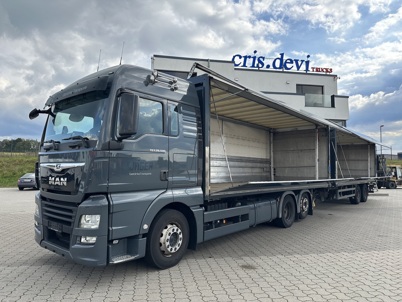 MAN TGX 26.500 6x2 LL Intarder Getränkezug LBW Ameise - Camion pentru transportul băuturilor: Foto 1 MAN TGX 26.500 6x2 LL Intarder Getränkezug LBW Ameise - Camion pentru transportul băuturilor: Foto 1